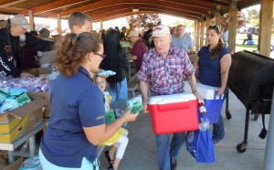 Marine Corps veteran Ed Kippenham receives food and dental supplies at the Sept. 3 distribution in Iron Mountain.