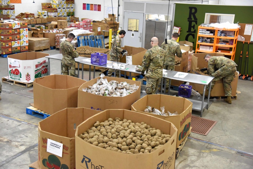 national guard sorting potatoes