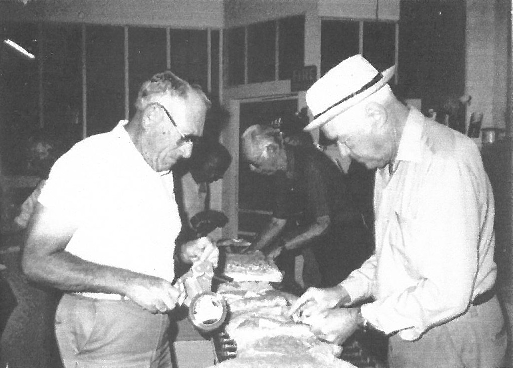 Early volunteers sort food in reclamation