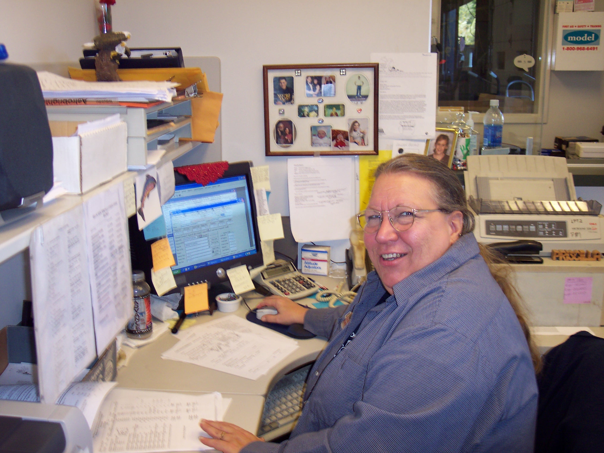 Priscilla working in the office