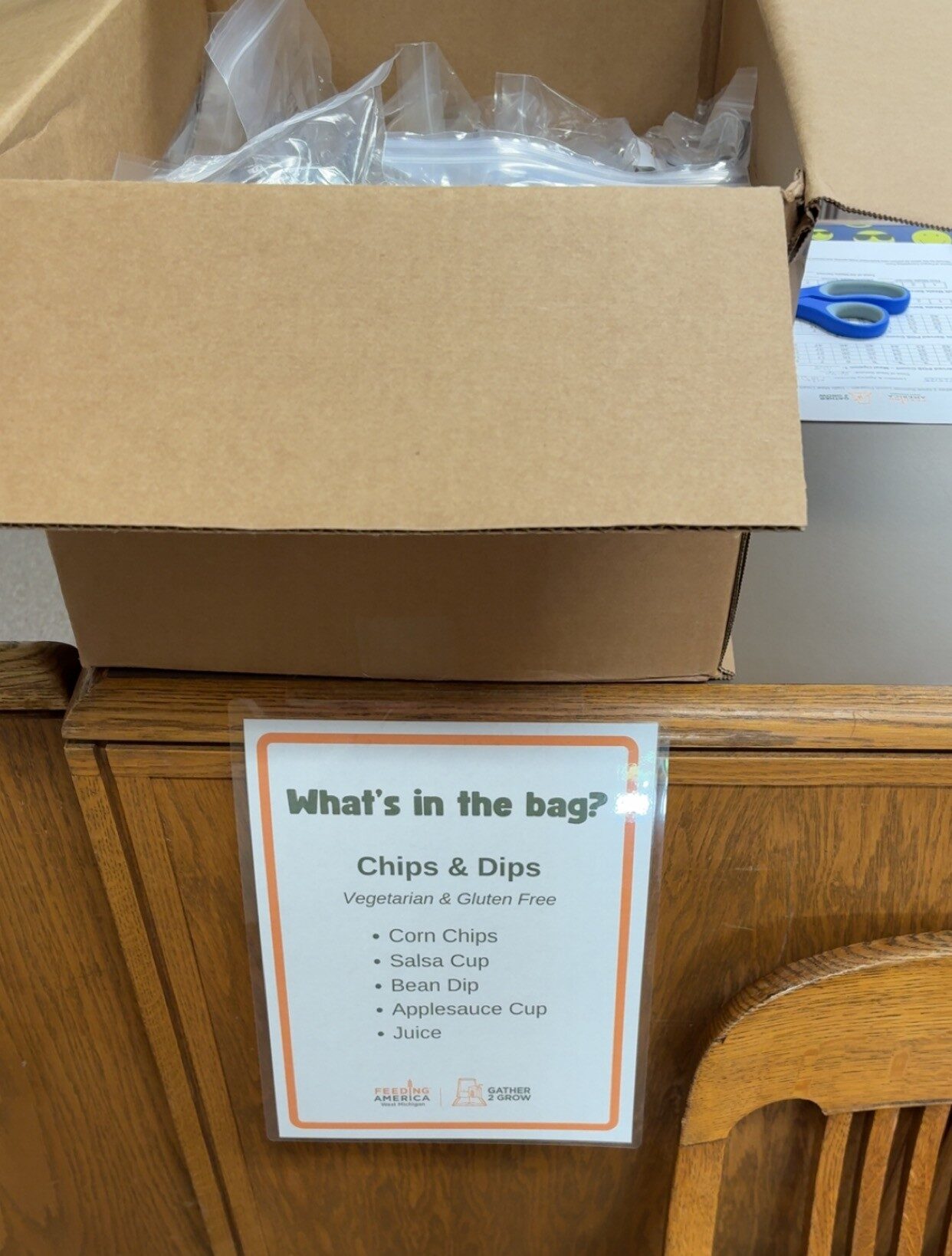 A grab-and-go-box containing Gather 2 Grow meals.