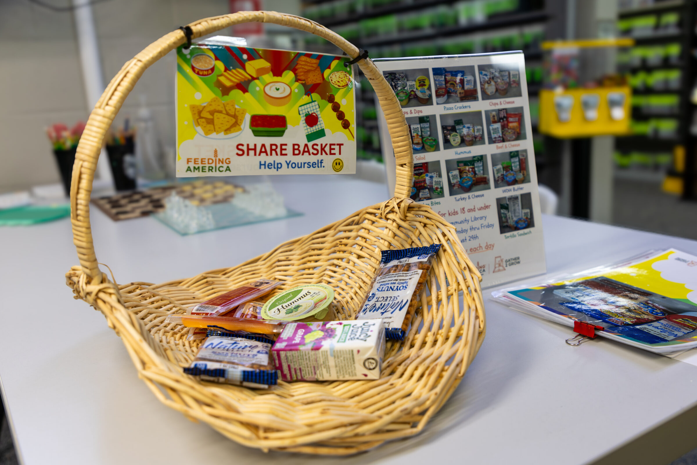 White Cloud Community Library’s share basket with several snacks in it.  