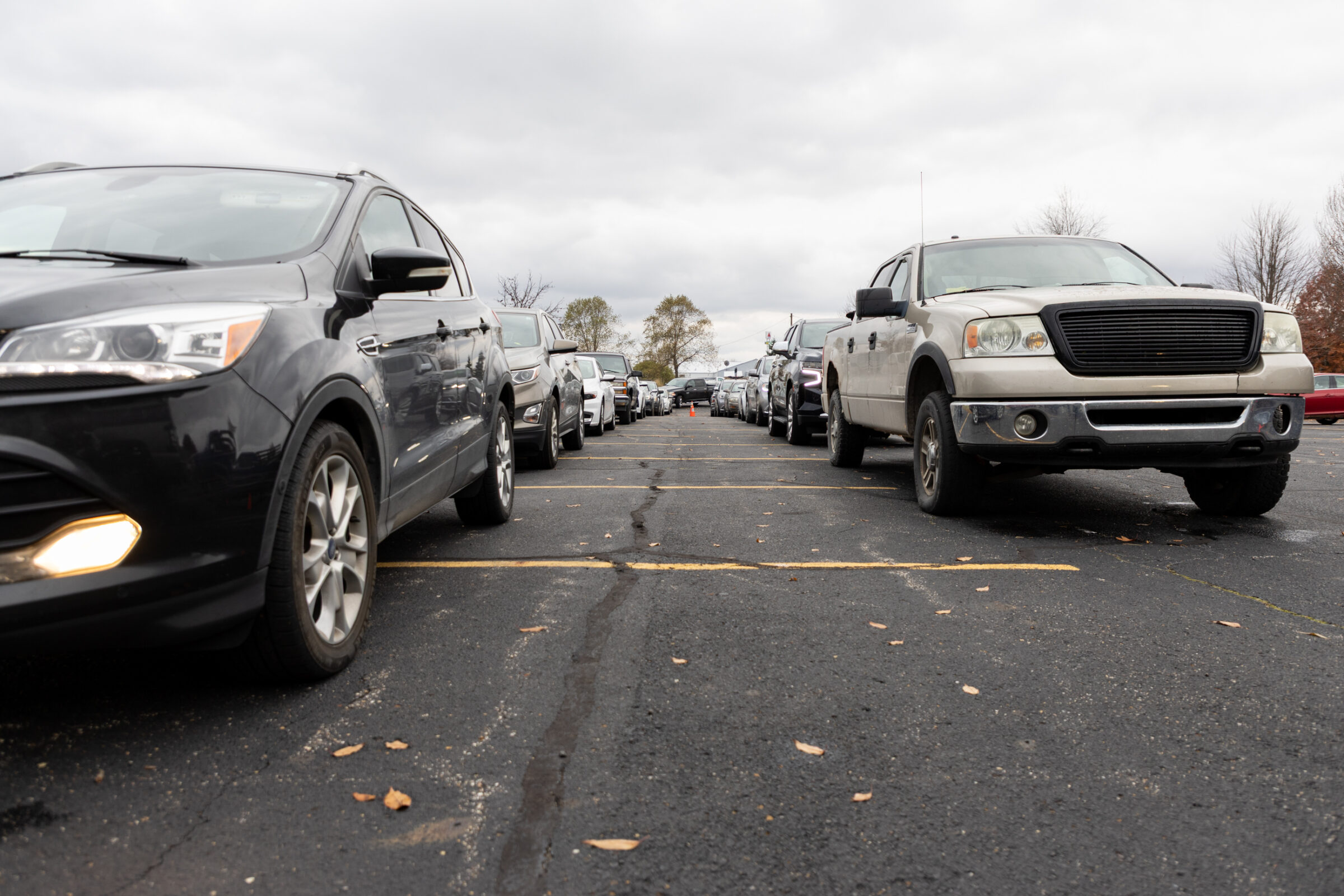 Lines of cars waiting at a mobile food pantry in Coopersville.