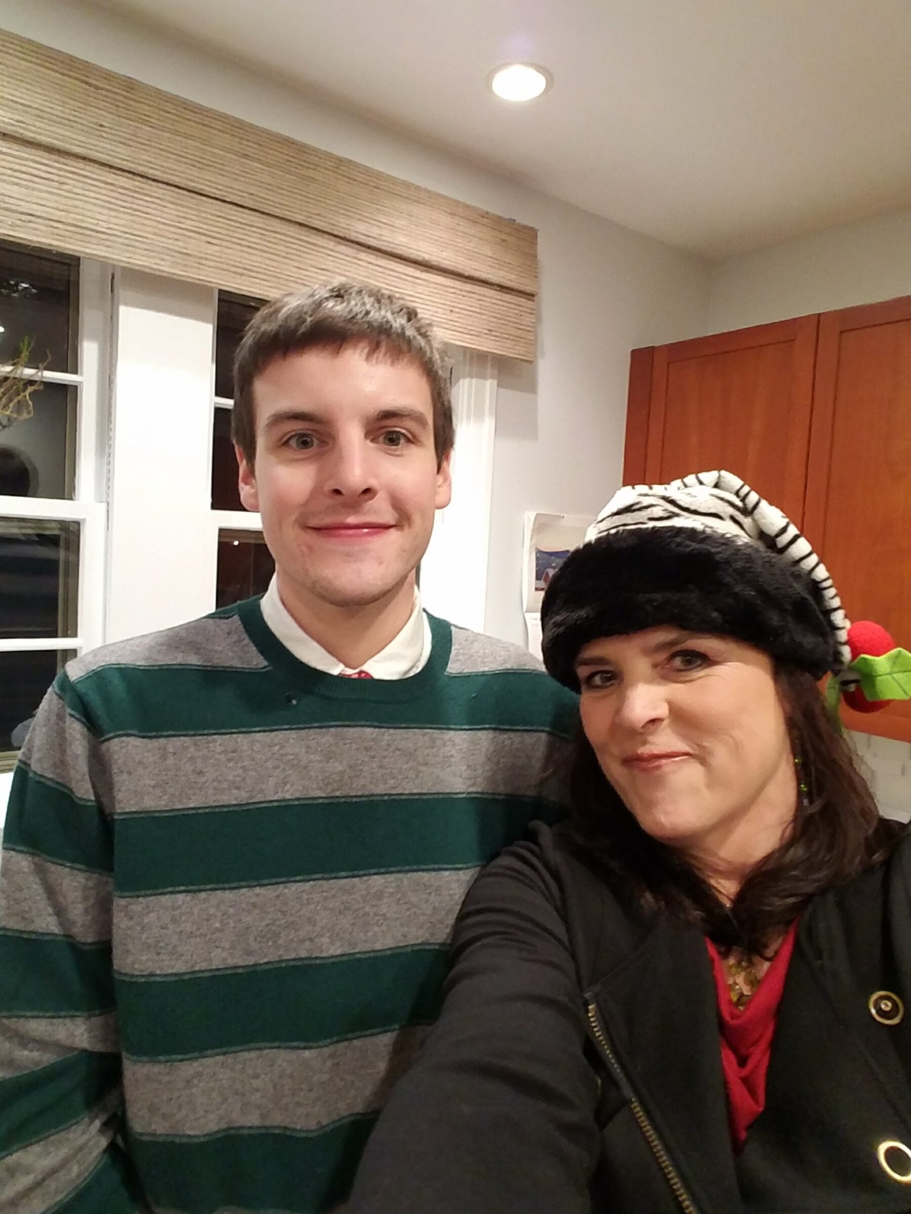 Chief Philanthropy Officer Pattijean taking a selfie with her son. 